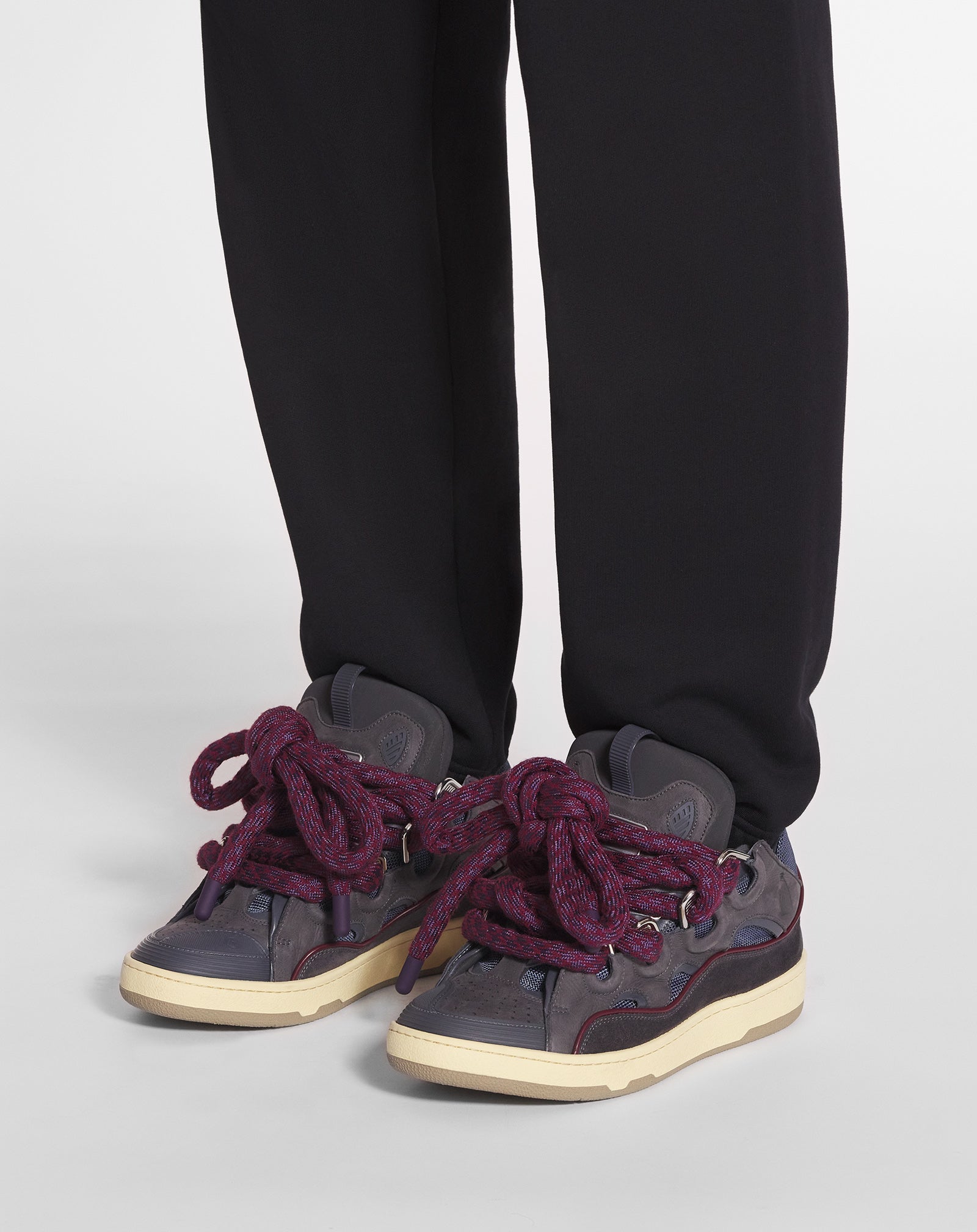 CURB SNEAKERS IN LEATHER WITH SNAKE LACES