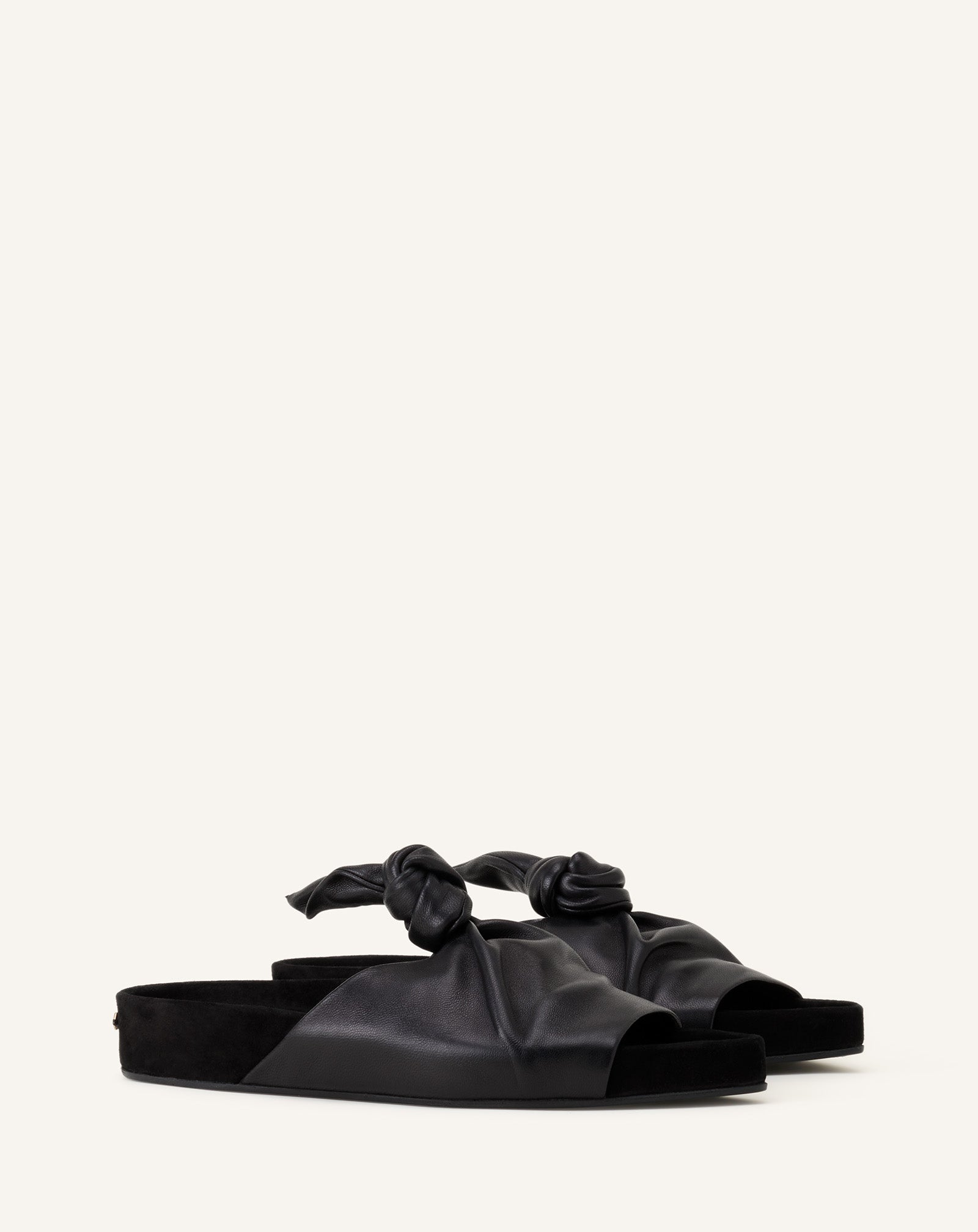 MULE PLATE COCOON EN CUIR NOIR