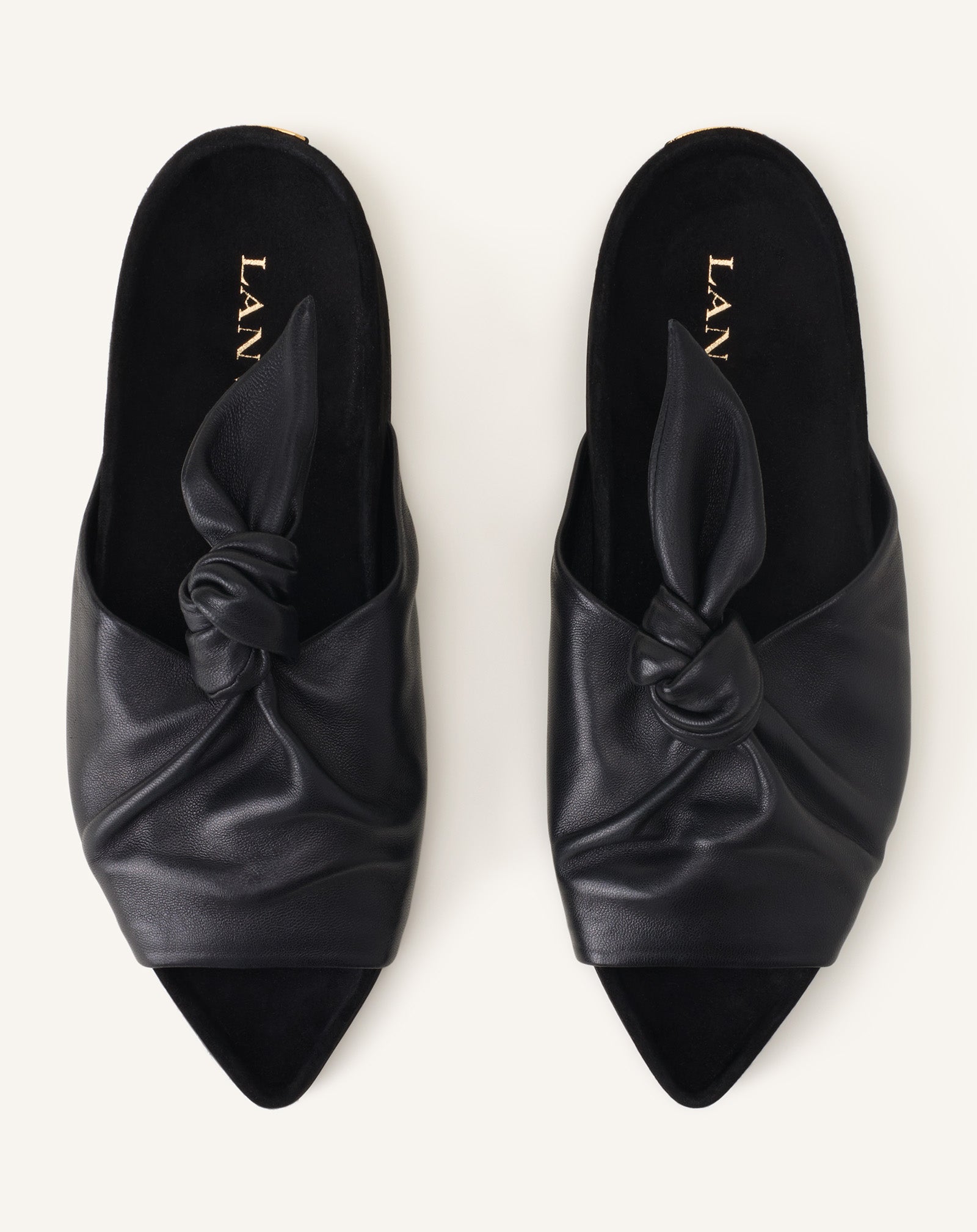MULE PLATE COCOON EN CUIR NOIR
