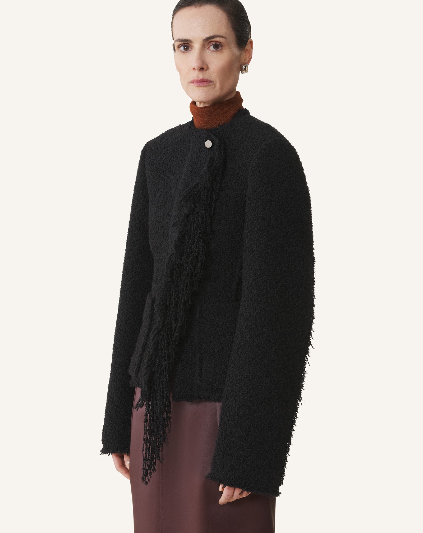 BLACK ASYMMETRICAL JACKET IN BOUCLÉ WOOL